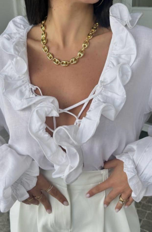 Blusa con volant e lacci